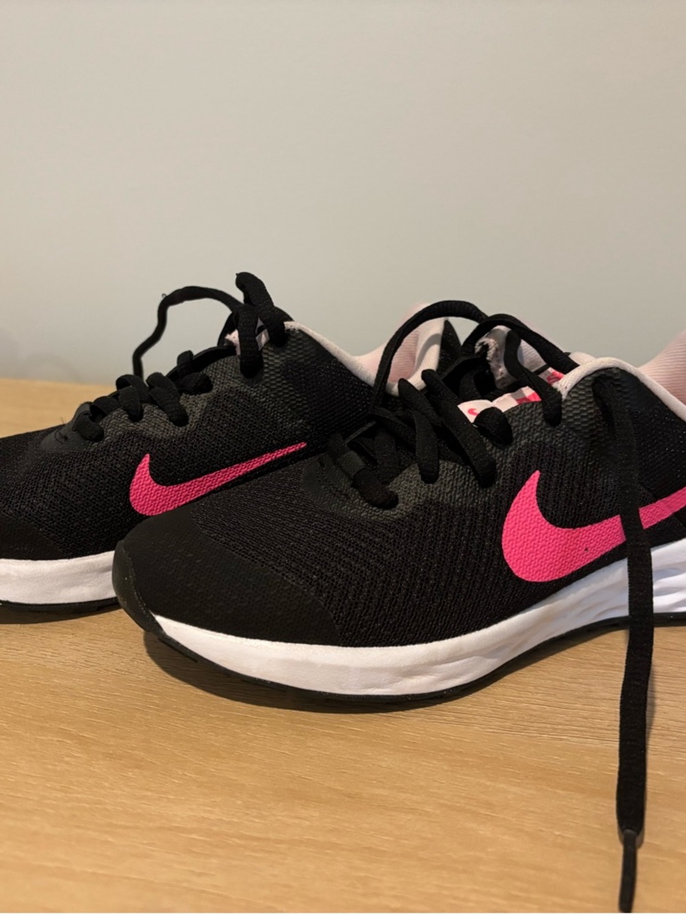 Nike Black Sneakers with Hot Pink Swoosh and White Midsole